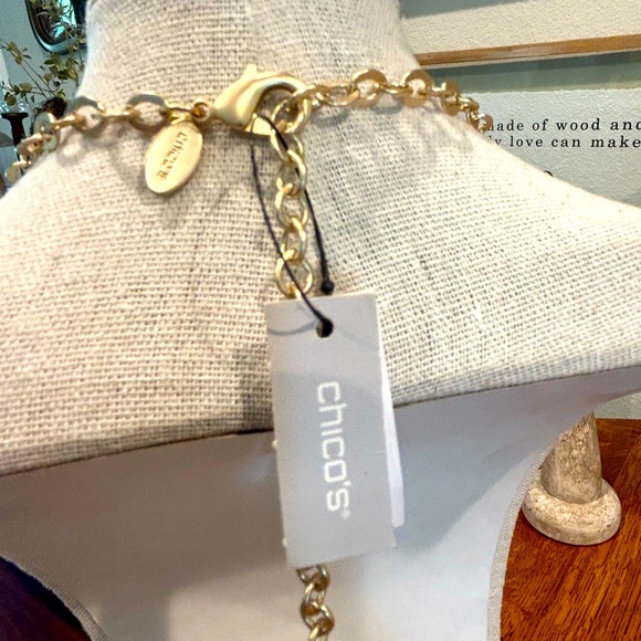 Chico’s 34 in charm necklace tag still attached. Charms include heart, star, etc - Picture 4 of 7
